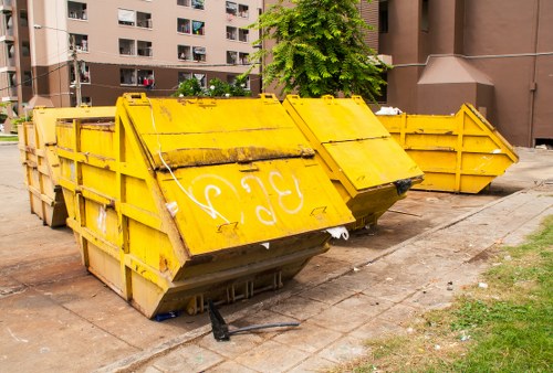 Waste collection vehicle in Colindale streets