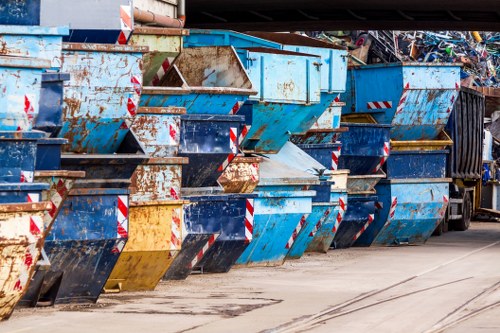 Waste collection trucks operating in North West London streets