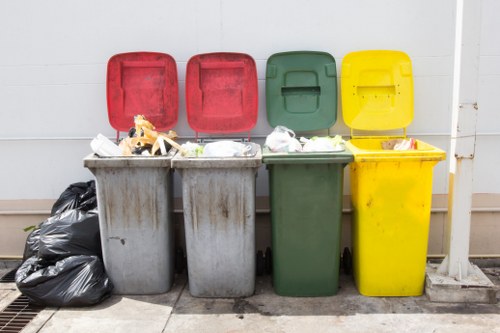 Waste collection trucks in Brondesbury