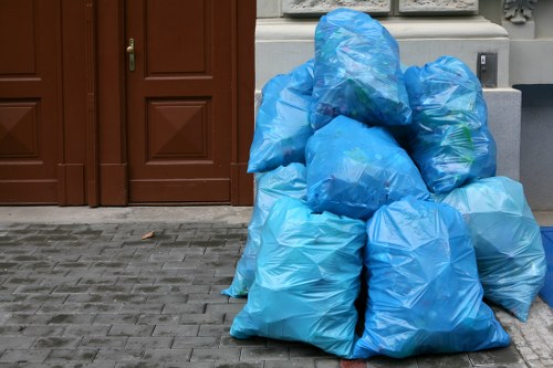 Community members participating in a recycling program in Kensal Green